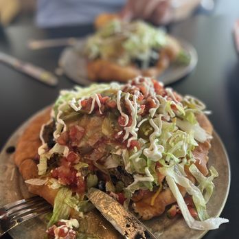 Indigenous Eats signature dishes Ndn TacoWild Rice BowlHuckleberry Frybread
